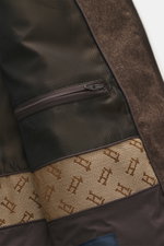 Innenansicht der Herno Daunenweste braun meliert mit Mix aus Seide und Cashmere, weichem Griff, Daunenfüllung, Slim Fit, Reißverschluss.