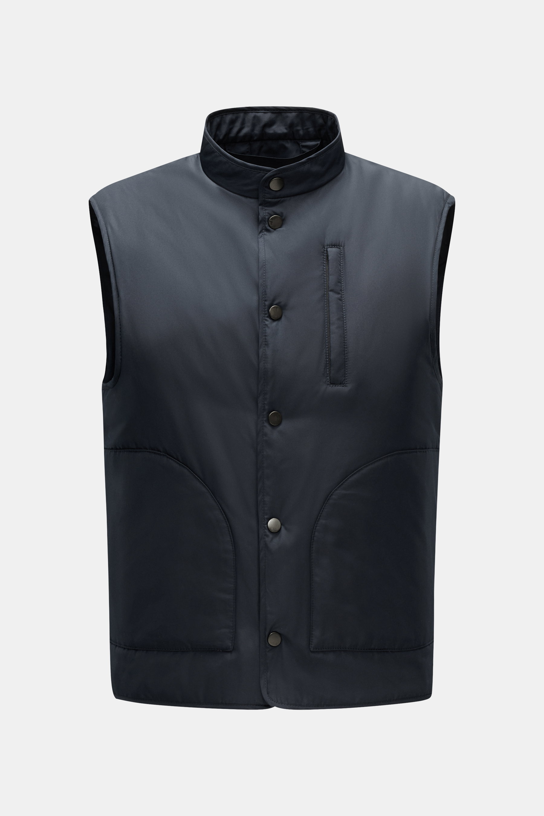 Front view of the 04651/ A trip in a bag Outdoor vest 'Padded Nylon' navy with slim fit, stand-up collar, five-button placket, piped zipper chest pocket, and patch front pockets.

Description: <p>For sporty layering looks in the transitional season: The o