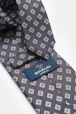 Bigi Silk tie 'Nilo' dark grey/light blue/white patterned photographed close-up from above, pure silk with subtle sheen, classic diamond pattern, lining identical to outer fabric, made in Italy, width 8 cm.