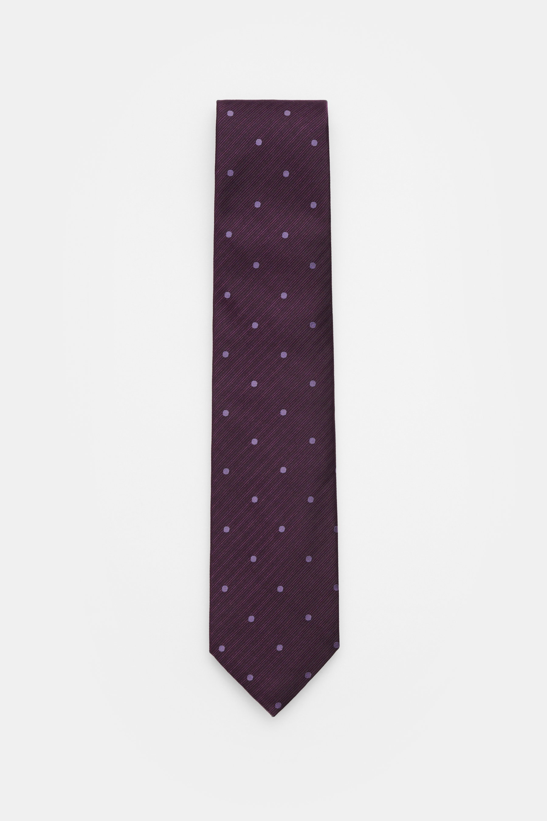 Tom Ford Seidenkrawatte dunkel violett gepunktet, aus reiner Seide, dezenter Glanz, Logo-Stitching, Draufsicht, made in Italy.