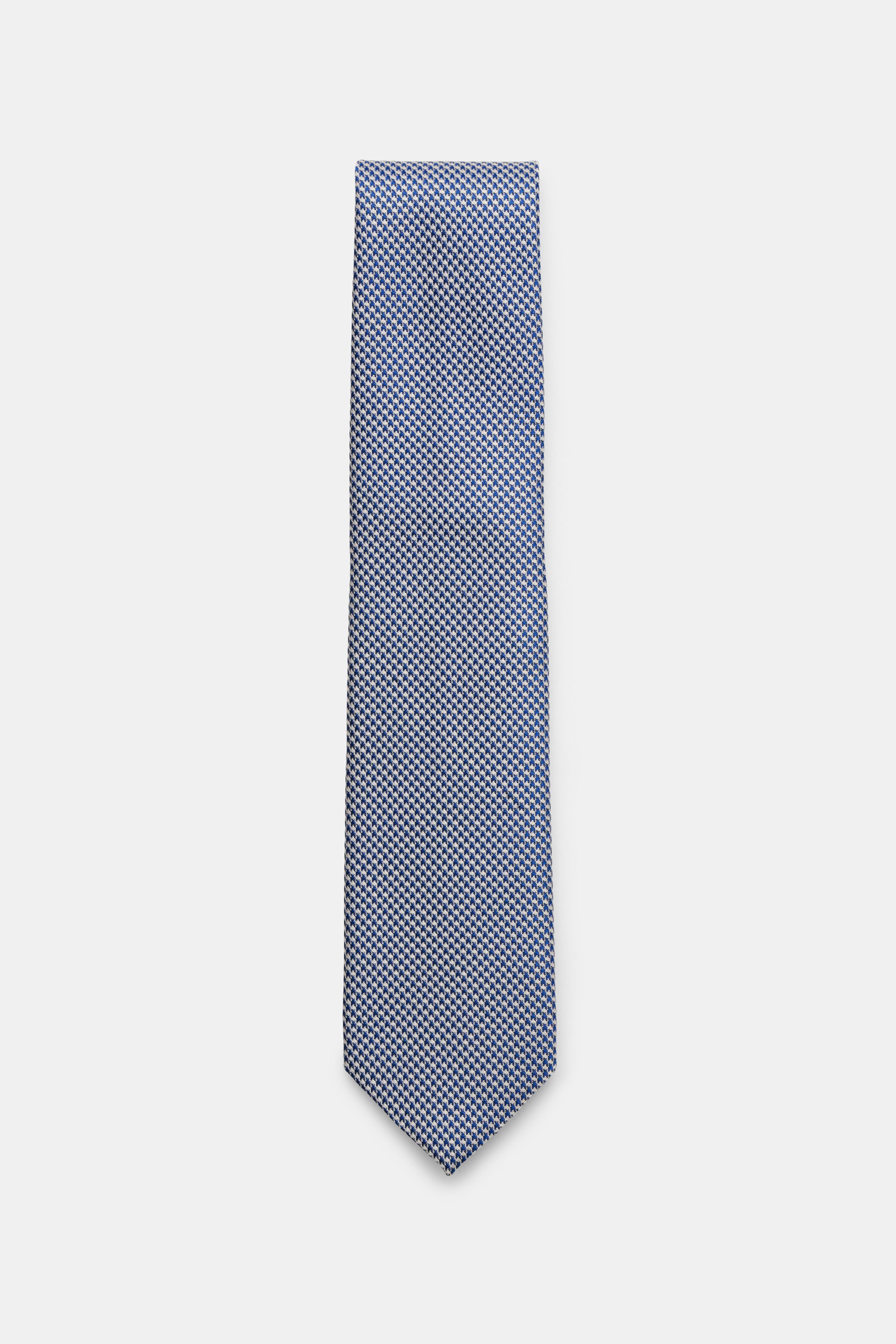 Tom Ford Seidenkrawatte blau/weiß gemustert, frontal fotografiert, reine Seide, dezenter Glanz, feines Webmuster, Made in Italy, 8 cm breit.