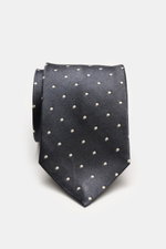 Tom Ford Seidenkrawatte anthrazit/creme gepunktet, reine Seide, dezenter Glanz, monochromes Futter, Logo-Stitching, 8 cm breit, Frontansicht, made in Italy.