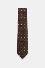 Tom Ford Seidenkrawatte dunkelbraun/creme gepunktet, frontal fotografiert, reine Seide, dezenter Glanz, monochromes Futter, Logo-Stitching, Breite 8 cm, made in Italy.