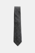 Front view of Tom Ford Silk tie dark grey/black/cream patterned, featuring a timeless herringbone pattern with polka dots, subtle sheen, and logo stitching.

Description: <p>Confident elegance down to the finest detail: This fine silk tie by TOM FORD is a