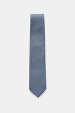 Tom Ford Seidenkrawatte hellblau/schwarz gemustert mit zeitlosem Hahnentritt, feine Seide, dezenter Glanz, Logo-Stitching, 8 cm breit, frontal fotografiert.