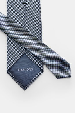 Tom Ford Seidenkrawatte hellblau/schwarz gemustert mit zeitlosem Hahnentrittmuster, Logo-Stitching, aus reiner Seide, fotografiert von oben.