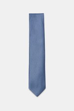 Tom Ford Seidenkrawatte rauchblau/schwarz gemustert mit zeitlosem Hahnentrittmuster, Logo-Stitching, Breite 8 cm, aus reiner Seide, frontal fotografiert.