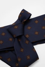 Cesare Attolini Krawatte 'Ventaglio' navy/bordeaux/braun gemustert, Detailfoto von oben, Mix aus Wolle und Seide, Medaillonmuster, Made in Italy, Breite 8,5 cm