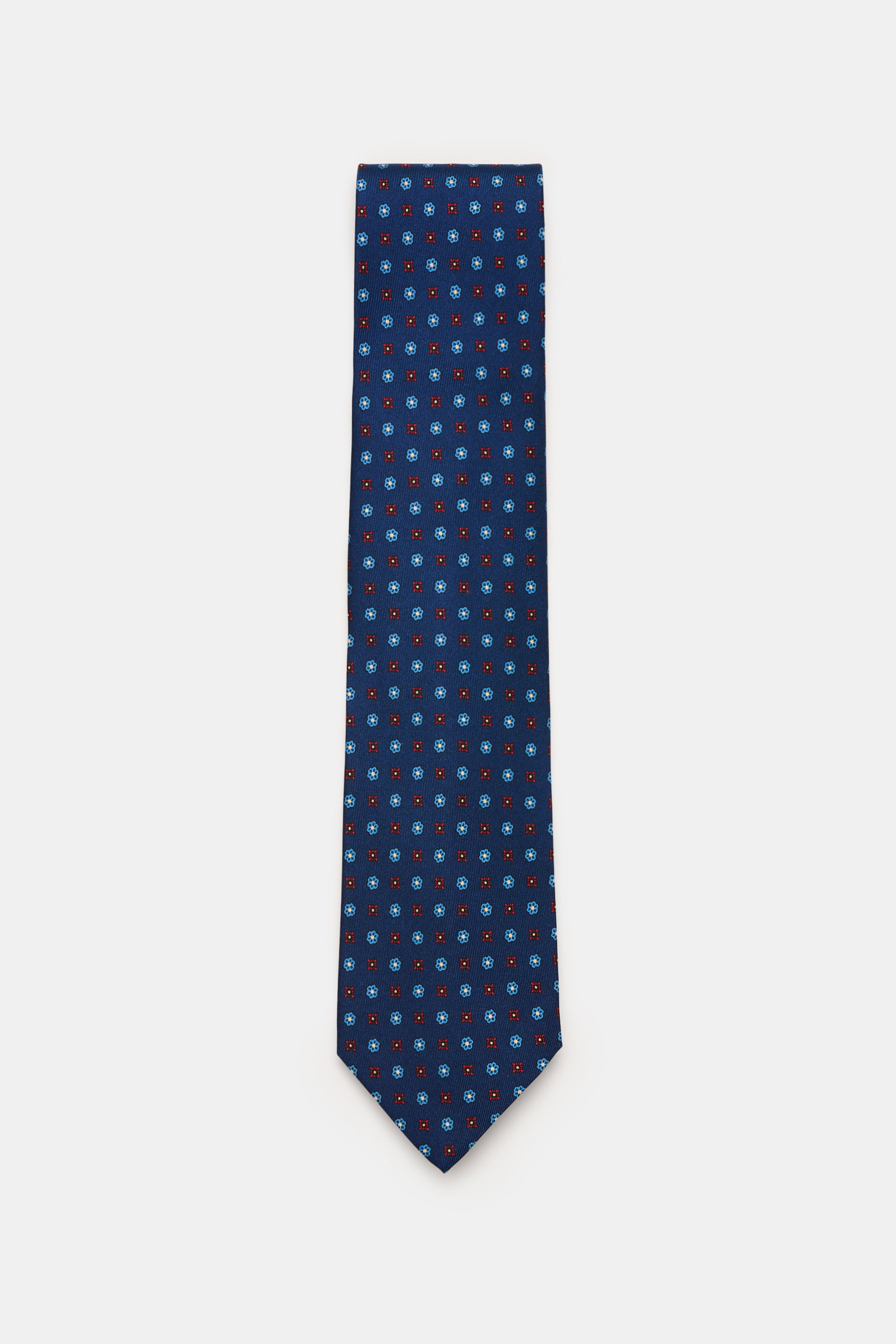 Cesare Attolini Silk tie 'Ventaglio' dark blue/blue/red patterned, photographed from above, featuring a floral pattern, pure silk, Made in Italy, width 8.5 cm.