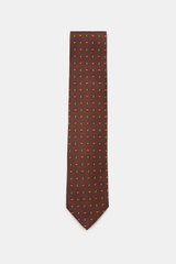 Cesare Attolini Silk tie 'Ventaglio' brown/green/rust brown patterned shown from above, pure silk, smooth feel, subtle shine, noble paisley pattern, made in Italy, width 8.5 cm.