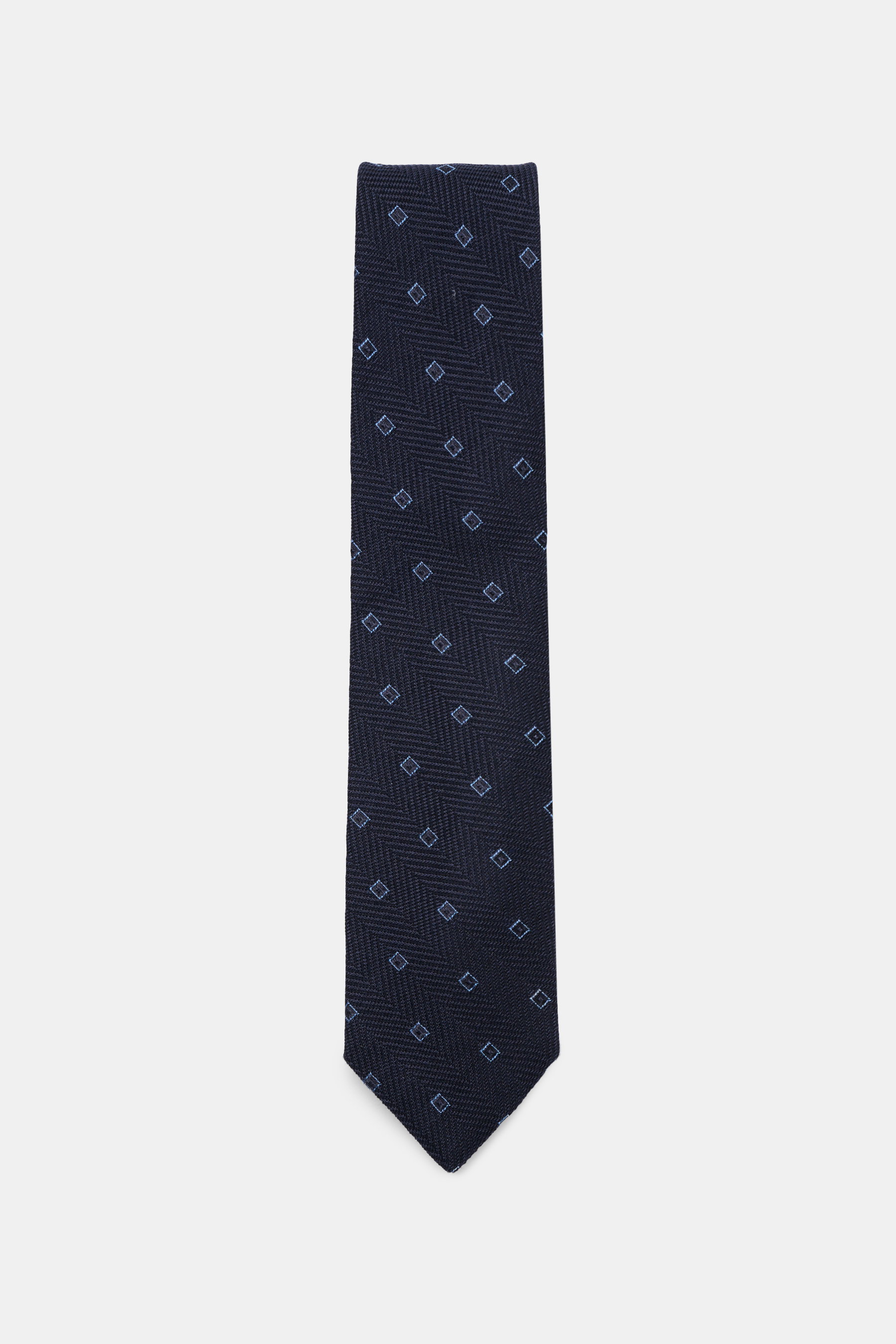 Borrelli Krawatte navy/hellblau gemustert, frontal fotografiert, handgefertigt aus Seide und Schurwolle, dezenter Glanz, grafisches Muster, tonaler Futterstoff, Made in Italy, Breite 8 cm.