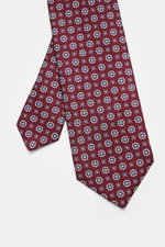 Borrelli Seidenkrawatte bordeaux/graublau gemustert, handgefertigt in Italien, florales Webmuster, seitliche Draufsicht, reine Seide, 8 cm breit.