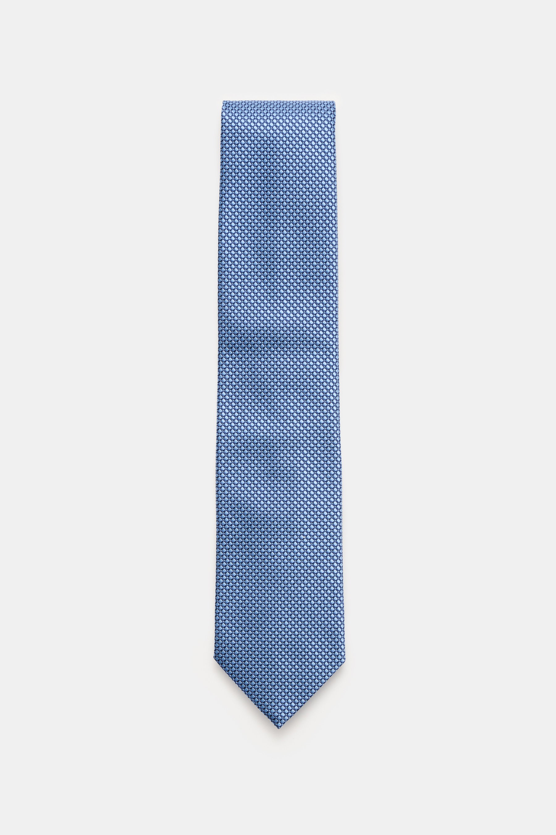 Zegna Seidenkrawatte hellblau/dunkelblau gemustert, frontale Draufsicht, reine Seide, dezenter Glanz, grafisches Webmuster, kontrastfarbener Futterstoff, Made in Italy, Breite ca. 8 cm.