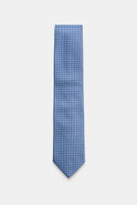 Zegna Seidenkrawatte hellblau/dunkelblau gemustert, frontale Draufsicht, reine Seide, dezenter Glanz, grafisches Webmuster, kontrastfarbener Futterstoff, Made in Italy, Breite ca. 8 cm.