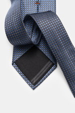 Zegna Silk tie smoke blue/black/cream patterned shown from a close-up front angle, featuring pure silk, subtle shine, graphic pattern, Made in Italy, width approx. 8 cm.