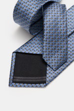 Zegna Seidenkrawatte hellblau/hellgrau/schwarz gemustert, fotografiert von oben, reine Seide, dezenter Glanz, grafisches Muster, Made in Italy, Breite ca. 8 cm