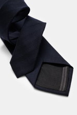 Zegna Tie navy shown from a close-up top angle, featuring a mix of wool and silk, subtle shine, subtle striped pattern, Made in Italy, width approx. 8 cm.