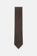 Zegna Seidenkrawatte dunkelbraun/navy gemustert, fotografiert von oben, reine Seide, dezenter Glanz, grafisches Webmuster, kontrastfarbener Futterstoff, Made in Italy, Breite ca. 8 cm.