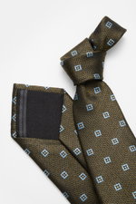 Zegna Silk tie smoky blue/navy patterned shown from above, pure silk with subtle shine, graphic woven pattern, contrasting lining, Made in Italy, approx. 8 cm wide.