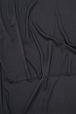 Close-up top-down view of Tom Ford Scarf dark grey, showcasing fine lightweight wool with soft texture and fringed edges.

Description: <p>Timeless elegance: The scarf by TOM FORD impresses with fine, lightweight wool and an exceptionally soft feel. The c