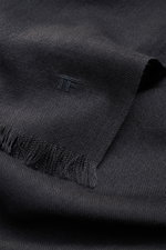Close-up front view of Tom Ford Scarf dark grey showing fine wool texture, tonal embroidered logo, and fringed edge.

Description: <p>Timeless elegance: The scarf by TOM FORD impresses with fine, lightweight wool and an exceptionally soft feel. The clean 
