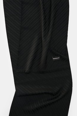 Emporio Armani Scarf black shown from a top front angle, featuring pure virgin wool, soft textured feel, distinctive striped weave pattern, all-around fringed edge, dimensions approx. 180 cm x 38 cm.
