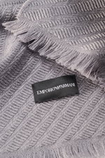 Close-up front view of Emporio Armani Scarf grey showing pure virgin wool, soft textured feel, distinctive striped weave pattern, all-around fringed edge, dimensions approx. 180 cm x 38 cm.