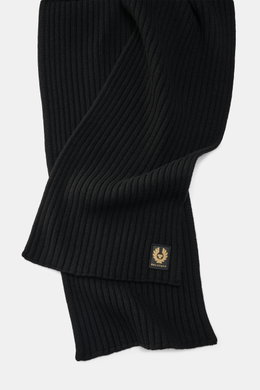 Close-up top-down view of the Belstaff Scarf 'Watch' black showing its wide rib knit pattern, soft pure wool texture, and typical BELSTAFF label.

Additional description:
<p>The cozy 'Watch' scarf by BELSTAFF made of pure wool with a modern rib knit look 