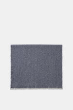 Brunello Cucinelli Cashmere scarf grey/dark blue patterned, folded flat and photographed from above, showing classic herringbone design.

<p>Quiet-luxury label BRUNELLO CUCINELLI is known for its elegant, timeless cashmere creations – like this two-tone w