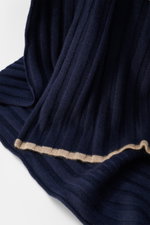Close-up side view of Brunello Cucinelli Cashmere Scarf navy, showing pure cashmere, soft touch, fine classic ribbed knit, 230x26 cm. Elegant through the winter with BRUNELLO CUCINELLI: This scarf made of pure cashmere in a distinctive ribbed knit design 