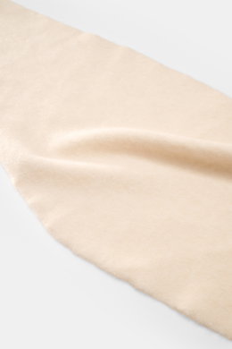 Smooth, soft Filippo de Laurentiis Bandana sand knitted scarf shown from a close-up top view, highlighting its voluminous, fine knit texture.

<p>This soft bandana by FILIPPO DE LAURENTIIS is knitted from a noble material composition and is a practically 