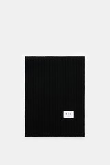 FTC Cashmere scarf black shown from above, flat on white background, rib knit pattern, large logo label visible.  
<p>An elegant, sustainably produced accessory for cold days: This scarf with rib knit pattern by FTC is made of luxurious, pure fair trade c