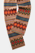 Polo Ralph Lauren Schal hellbraun/rot/orange gemustert, liegend fotografiert, mit Fair-Isle-Strickmuster, Wolle-Baumwolle-Leinen-Mix, doppellagig, ca. 164x20,5 cm.