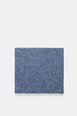 Folded scarf viewed from above showing dark blue and cream diagonal twill pattern and narrow fringed edge, 04651/ A trip in a bag Scarf 'Fancy Twill' dark blue/cream, mix of virgin wool, baby alpaca, high-quality microfiber, soft feel, coarse twill struct