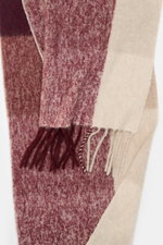 Close-up front view of the 04651/ A trip in a bag Scarf 'Color Block Scarf' bordeaux melange/beige/cream showing soft, fringed hem and color blocks.

Description: 
<p>Essential winter must-have: The noble scarf from 04651/ A TRIP IN A BAG becomes a favori