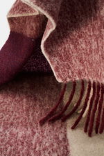 Close-up angled view of the 04651/ A trip in a bag Scarf 'Color Block Scarf' bordeaux melange/beige/cream showing soft texture and fringed hem.

<p>Essential winter must-have: The noble scarf from 04651/ A TRIP IN A BAG becomes a favorite piece for the co