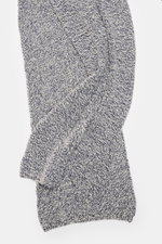 Top view of the 04651/ A trip in a bag Scarf offwhite/navy melange, showing coarse and cable knit patterns in a soft mix of virgin wool and cashmere, approx. 164 cm x 30 cm, styled for winter casualness with a pleasant warmth.