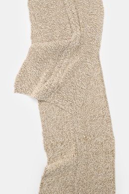 Top-down view of 04651/ A trip in a bag Scarf cream/beige melange with coarse and cable knit patterns in virgin wool and cashmere.

Description: 
<p>Winter casualness: The scarf by 04651/ A TRIP IN A BAG stylishly completes sophisticated looks with a soft