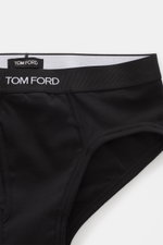 Tom Ford Sport Slip schwarz aus elastischer Baumwolle, weicher Griff, körpernah, seitlicher Eingriff, breiter elastischer Bund mit Tom Ford-Stitching, Nahaufnahme von oben.
