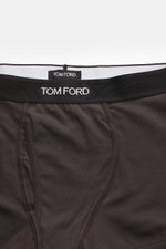 Tom Ford Boxershorts dunkelbraun, sportlich und luxuriös, Nahaufnahme von oben, elastischer Bund mit TOM FORD-Stitching, weiche Baumwolle