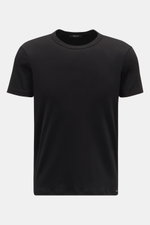 Front view of Tom Ford Rundhals-Unterhemd schwarz, a slim fit black T-shirt made of elastic cotton with a soft touch, round neckline, and small TOM FORD label at the hem.

<p>Cleanes Basic mit Rundhalsausschnitt: Das komfortable T-Shirt in hochwertiger Ba