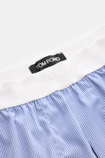 Tom Ford Boxershorts dunkelblau/weiß gestreift, Slim Fit aus leichter Baumwolle mit elastischem weißen Bund und seitlichem Eingriff, Nahaufnahme von oben.