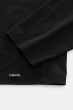 Close-up of the hem and sleeve of the Tom Ford Rundhals-Unterhemd weiß, showing soft fabric and small TOM FORD label from a side angle.

Description: <p>Cleanes Basic mit Rundhalsausschnitt: Das komfortable T-Shirt aus hochwertiger Baumwoll-Modal-Mischung