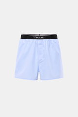 Tom Ford Boxershorts hellblau, sportlich, slim fit, reine Baumwolle, glatter Griff, seitlicher Eingriff, elastischer Bund mit TOM FORD-Stitching, frontale Nahaufnahme.