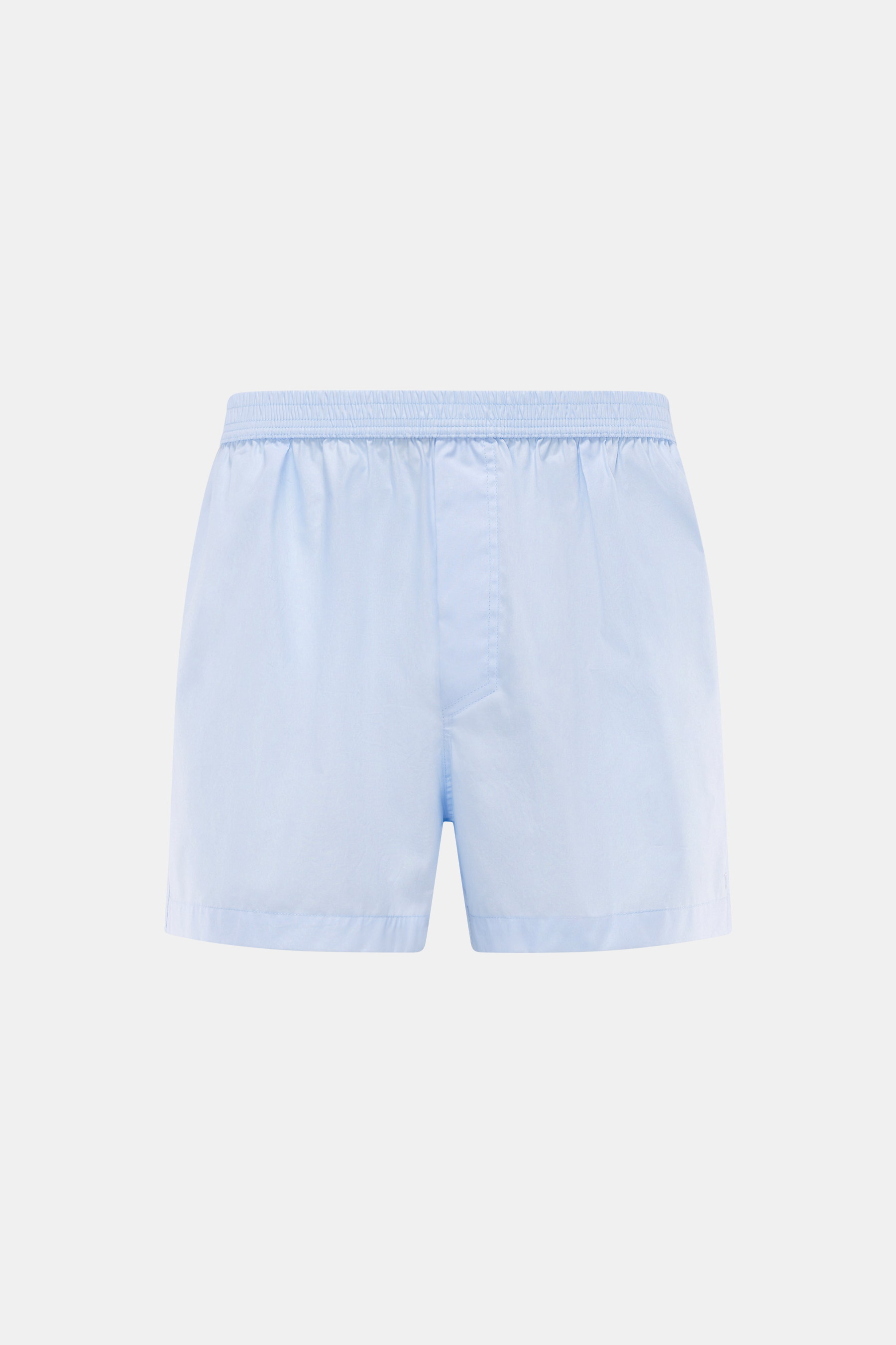Tom Ford Light Blue Boxer Shorts shown from the front, sporty and simple design in pure cotton with elastic waistband, side fly, slim fit, and smooth feel. Sporty, simple, and luxurious: The comfortable boxer shorts by TOM FORD with a practical fly and el
