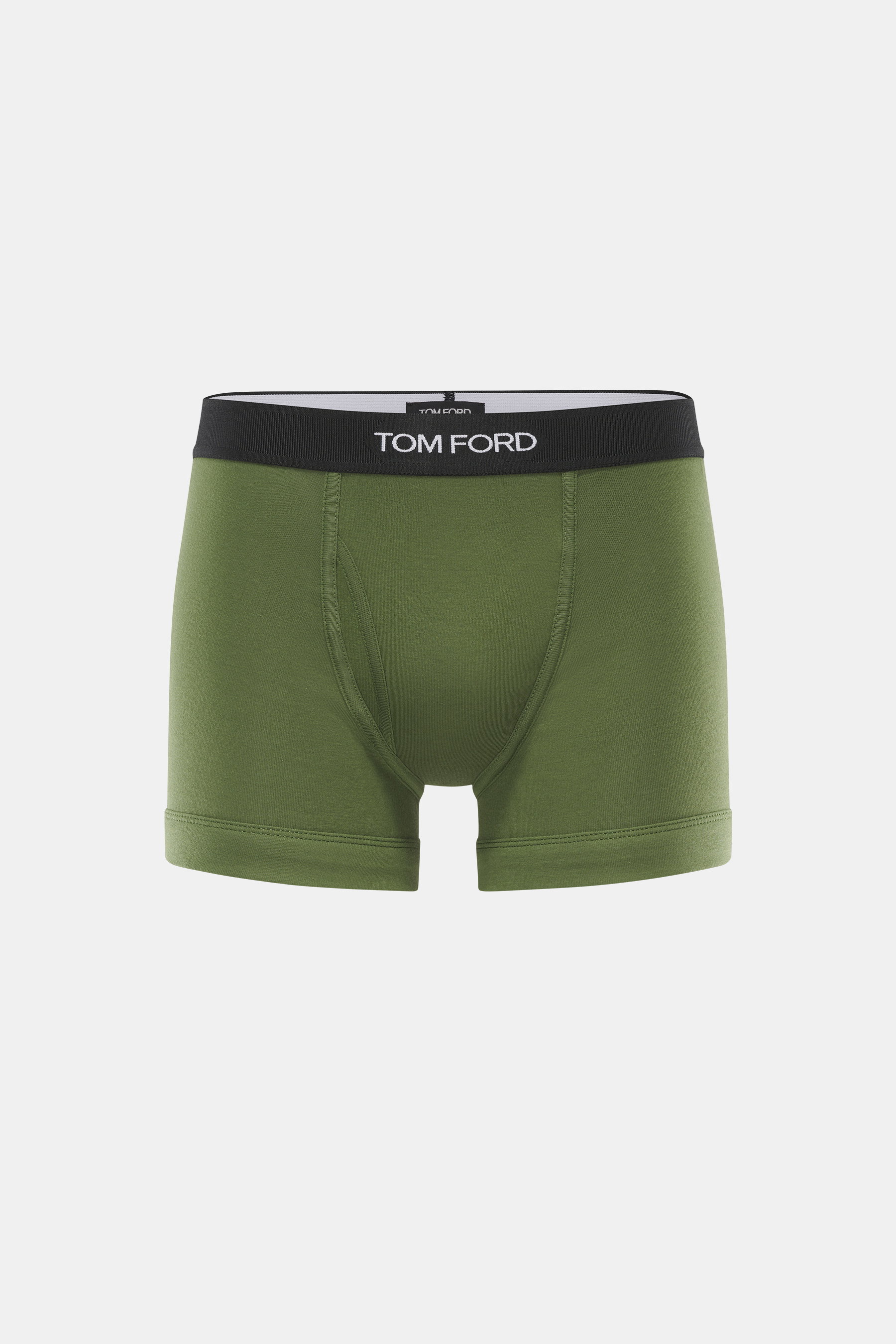 Frontale Nahaufnahme der sportlichen, monochromen Tom Ford Boxershorts grün mit elastischem Bund, seitlichem Eingriff und hochwertiger Baumwolle.
