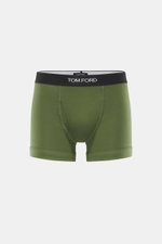 Frontale Nahaufnahme der sportlichen, monochromen Tom Ford Boxershorts grün mit elastischem Bund, seitlichem Eingriff und hochwertiger Baumwolle.