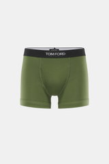 Frontale Nahaufnahme der sportlichen, monochromen Tom Ford Boxershorts grün mit elastischem Bund, seitlichem Eingriff und hochwertiger Baumwolle.