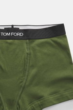 Tom Ford Boxershorts grün aus elastischer Baumwolle in Slim Fit, weicher Griff, seitlicher Eingriff, elastischer Bund mit TOM FORD-Stitching, Nahaufnahme von oben.