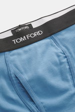 Nahaufnahme der Tom Ford Boxershorts 2er-Set dunkelbraun/rauchblau aus reiner Baumwolle mit elastischem Bund, seitlichem Eingriff und TOM FORD-Stitching, glatter Griff, Slim Fit, schlichter Stil, sportlich-luxuriös, Vorderansicht.